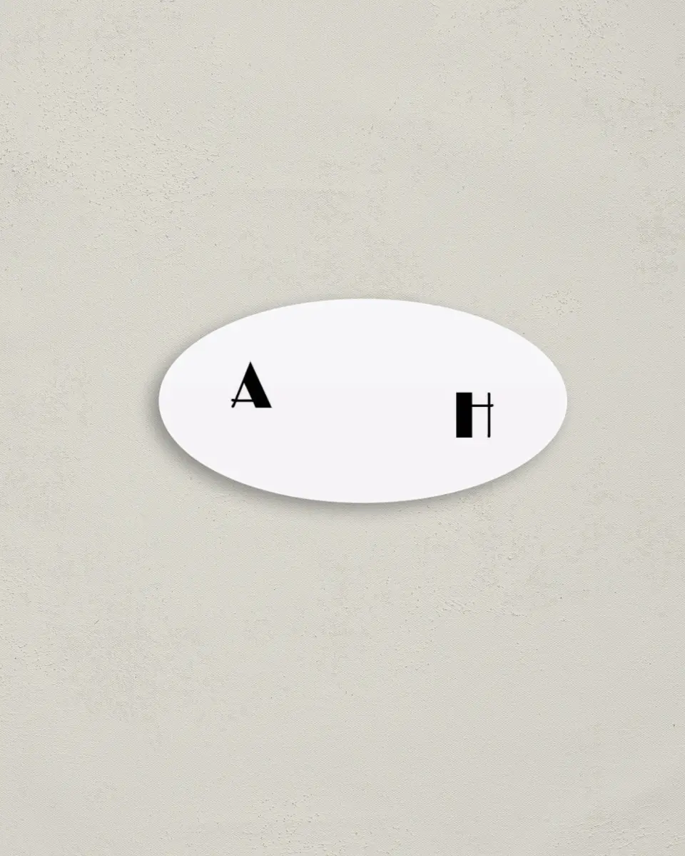 This is a 3" x 1½" Envelope Seal called Modern Initial printed in full color