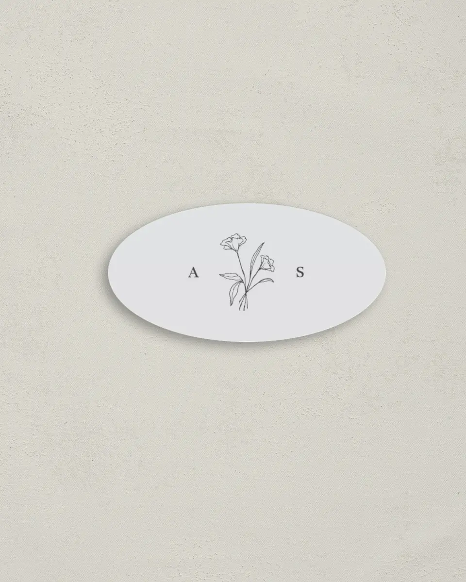 This is a 3" x 1½" Envelope Seal called Monogram Bloom printed in full color