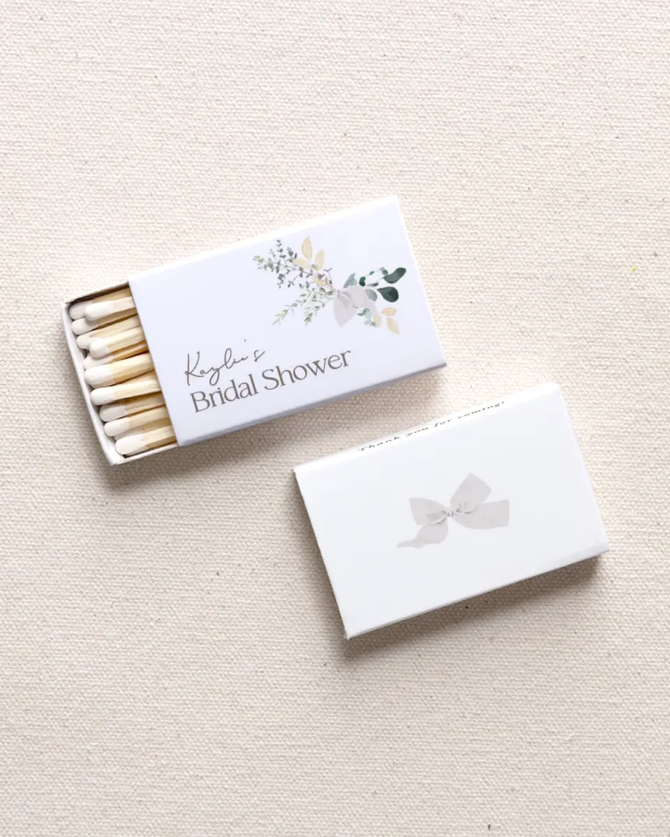 This is a 2.25" x 1.409" x .4" Wedding Matche called Botanical Bow printed in full color with Gold foil