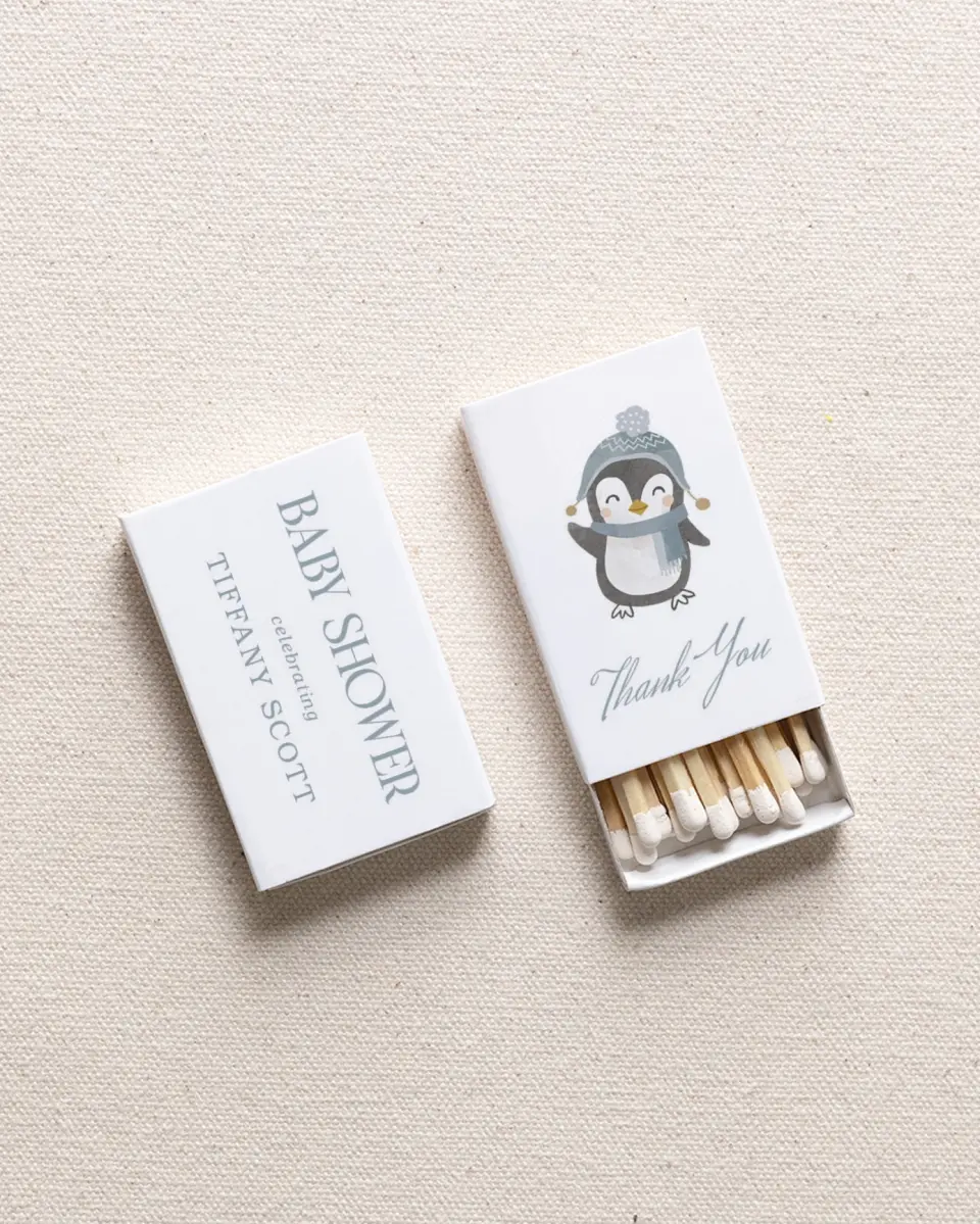 This is a 2.25" x 1.409" x .4" Wedding Matche called Arctic Animals printed in full color with Gold foil