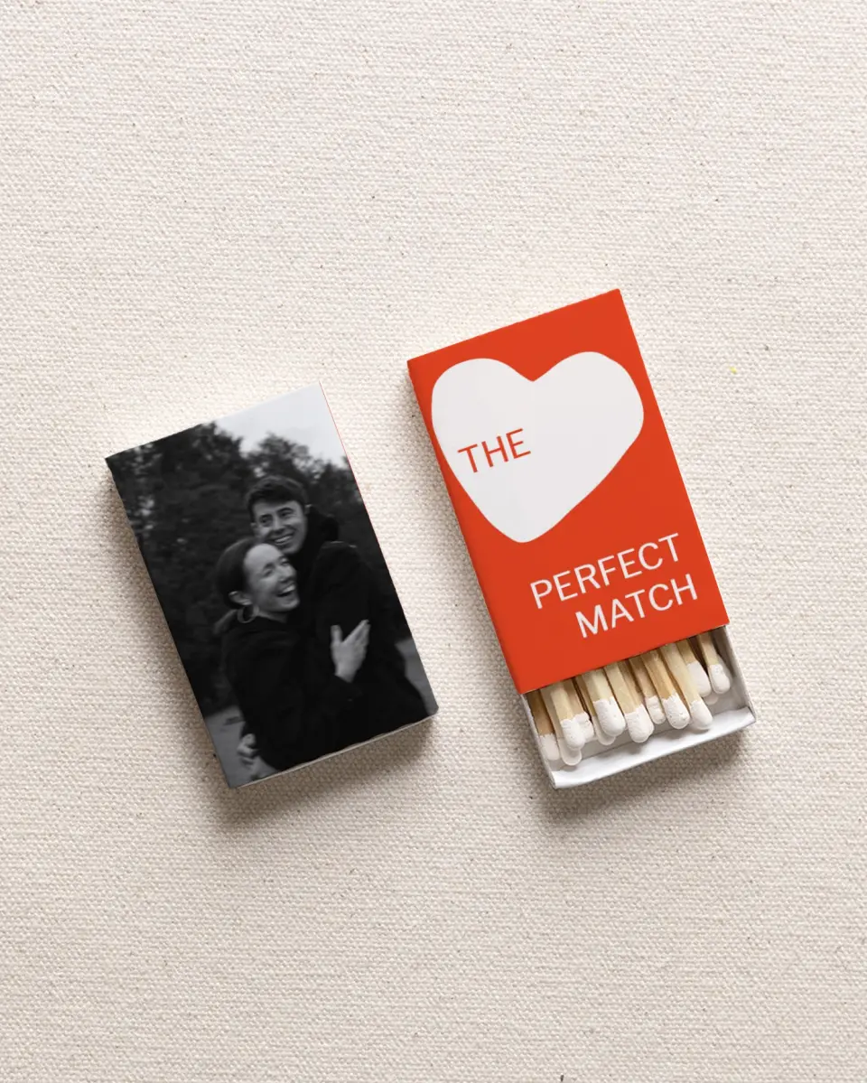 This is a 2.25" x 1.409" x .4" Wedding Matche called Modern Heart printed in full color with Silver foil