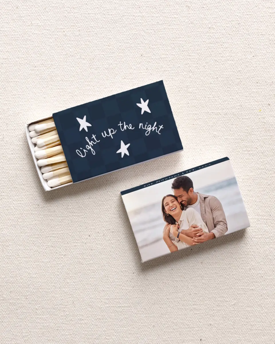 This is a 2.25" x 1.409" x .4" Wedding Matche called Light Up The Night printed in full color with Gold foil