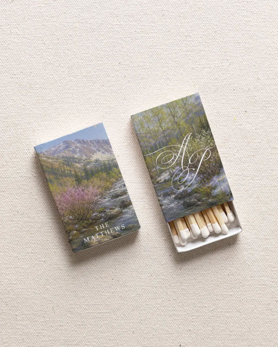 This is a 2.25" x 1.409" x .4" Wedding Matche called Alpine Promise printed in full color with Rose Gold foil