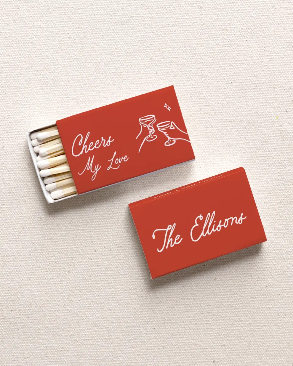 This is a 2.25" x 1.409" x .4" Wedding Matche called Cheers My Love printed in full color with Rose Gold foil
