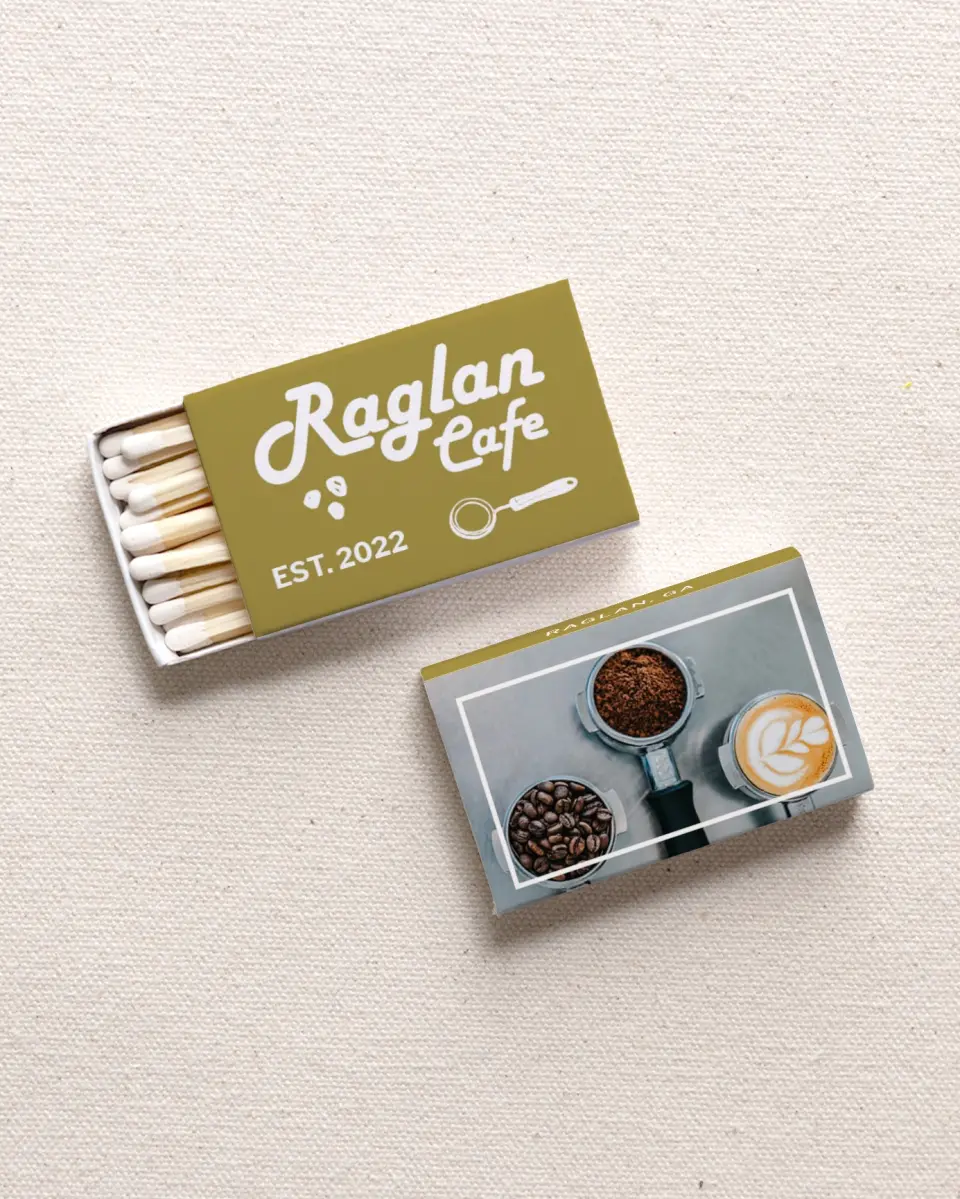 This is a 2.25" x 1.409" x .4" Business Matche called Raglan Cafe printed in full color with Gold foil