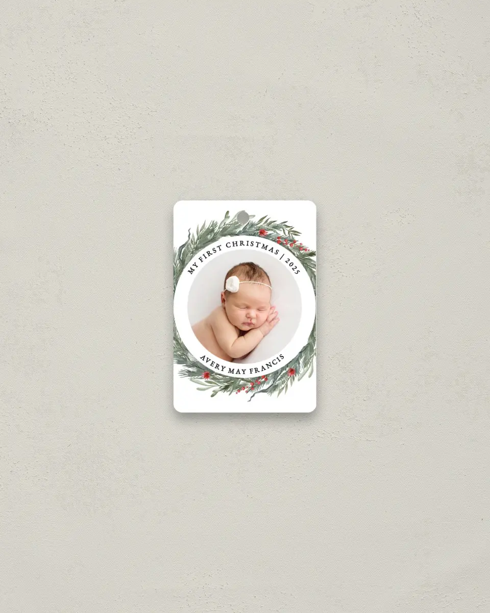 This is a 2" x 3" Metal Ornament called Baby's First Christmas printed in full color