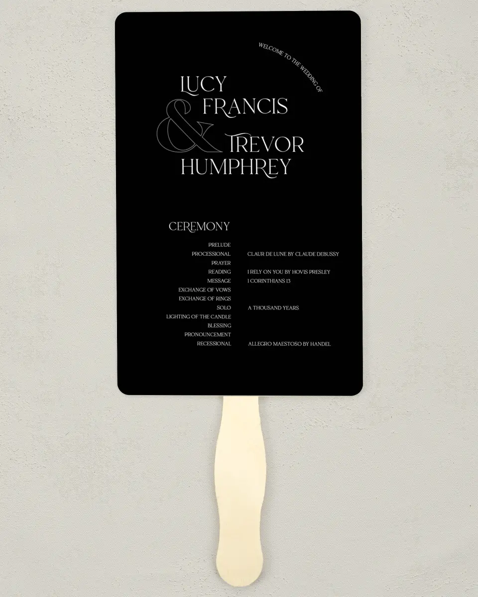 This is a 5" x 7⅞" Wedding Program Fan called The Lucy printed in full color with Silver foil on Luxe Satin (coated) paper