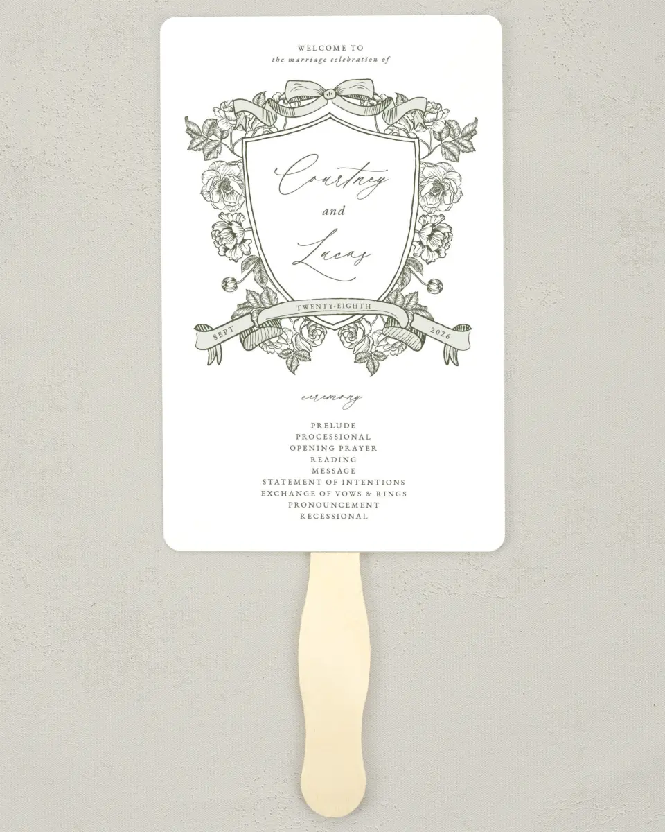 This is a 5" x 7⅞" Wedding Program Fan called Elegant Crest printed in full color with Rose Gold foil on Luxe Satin (coated) paper