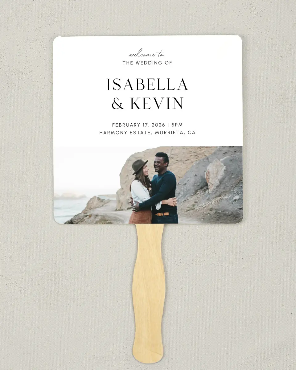 This is a 6¼" x 6¼" Wedding Program Fan called The Isabella printed in full color with Silver foil on Luxe Satin (coated) paper