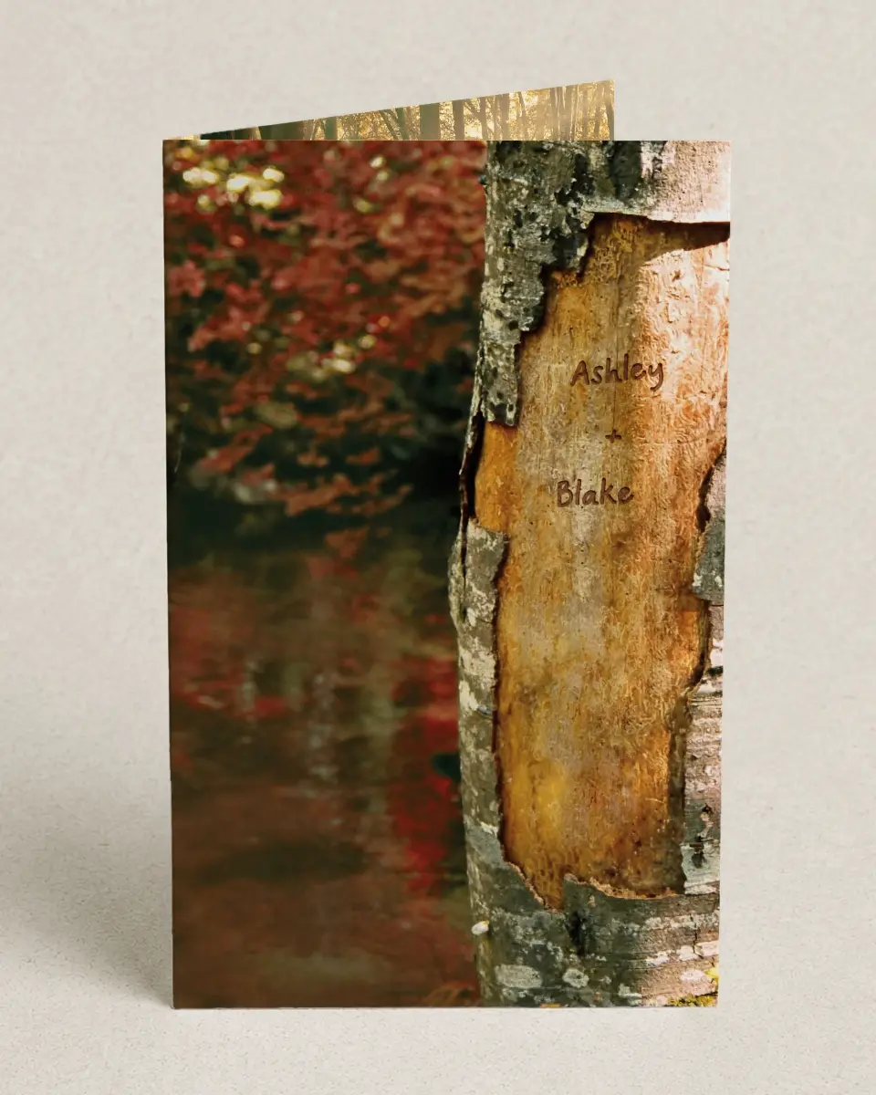 This is a 5" x 7⅞" Folded Half-fold Wedding Program called Carved in Love - Autumn printed in full color on Premium Smooth paper