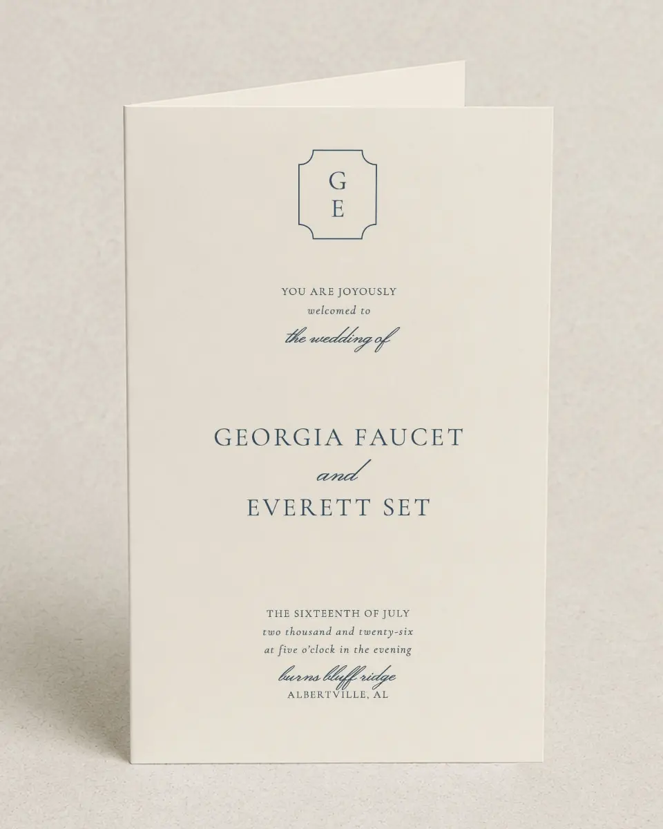 This is a 5" x 7⅞" Folded Half-fold Wedding Program called The Georgia printed in full color with Silver foil on Luxe Satin (coated) paper