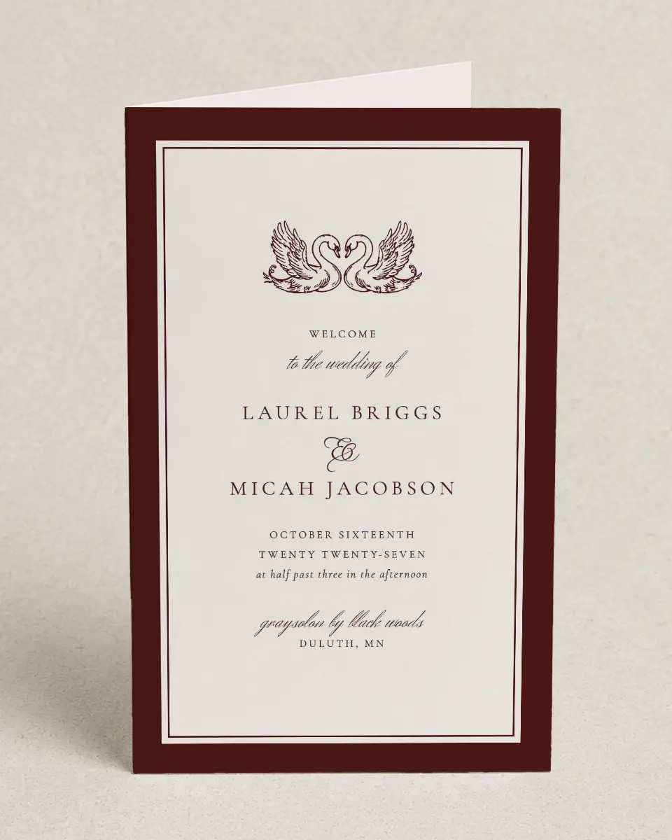 This is a 5" x 7⅞" Folded Half-fold Wedding Program called Swan Song printed in full color with Silver foil on Luxe Satin (coated) paper