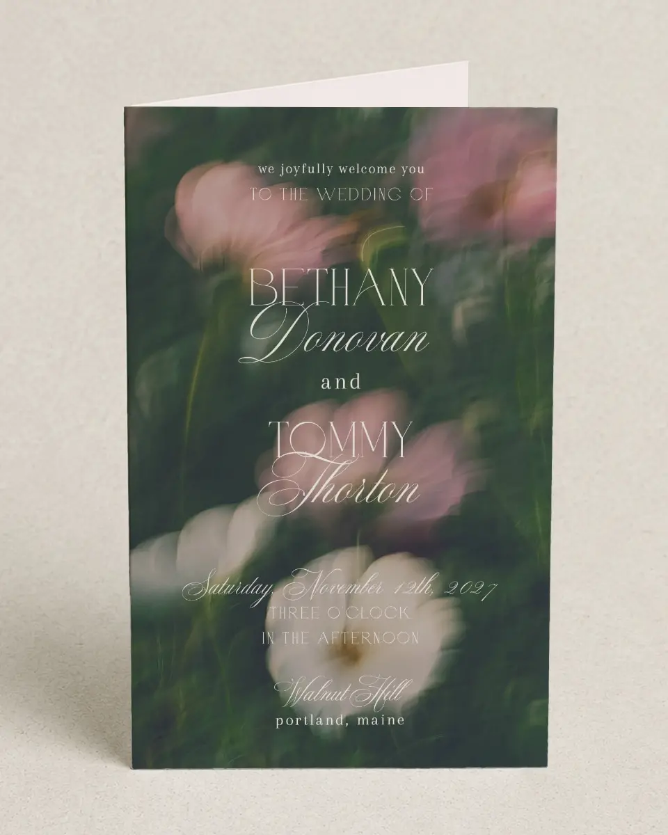 This is a 5" x 7⅞" Folded Half-fold Wedding Program called The Bethany printed in full color with Gold foil on Luxe Satin (coated) paper