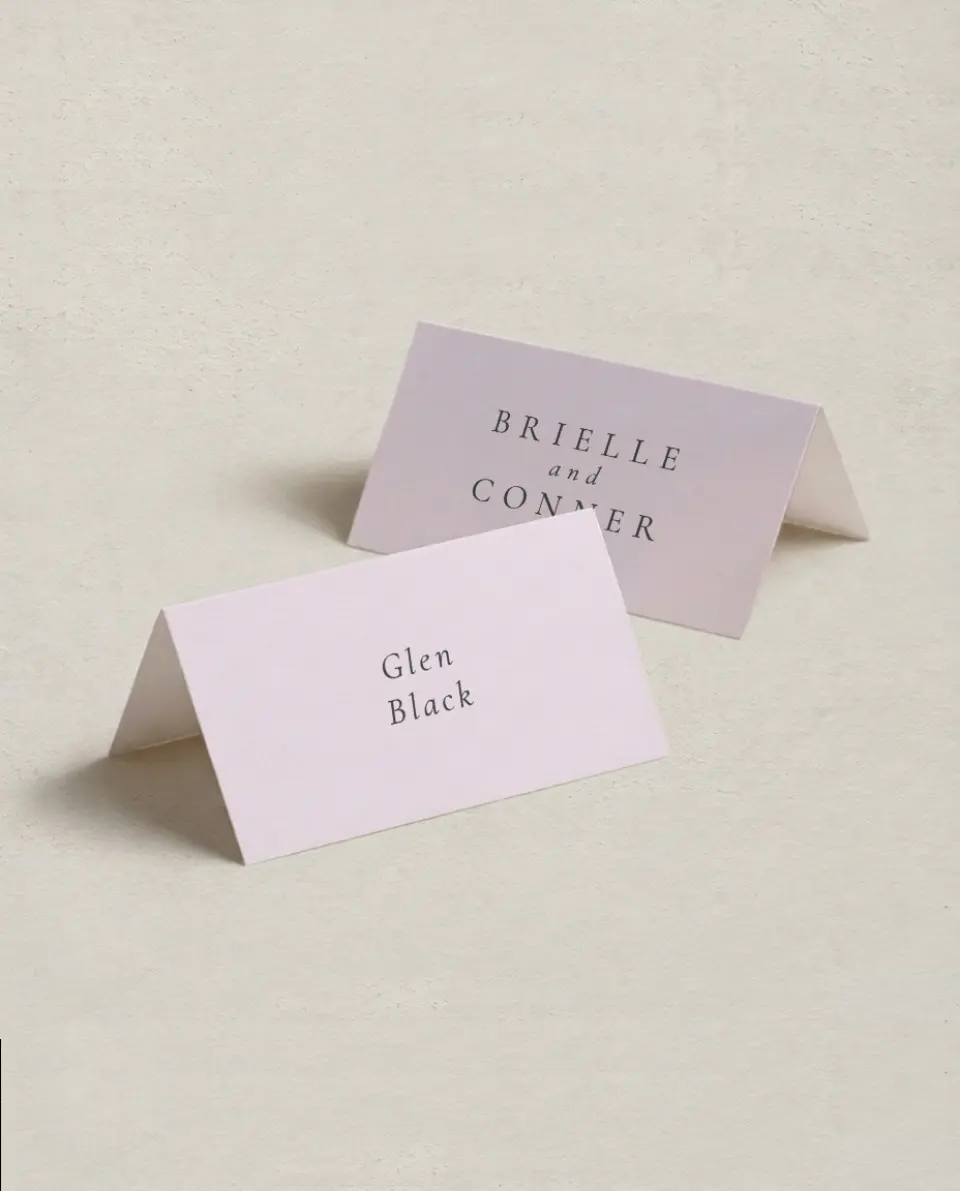 This is a 3½" x 2" Folded Wedding Place Card called Modest Moment printed in full color on Premium Smooth paper