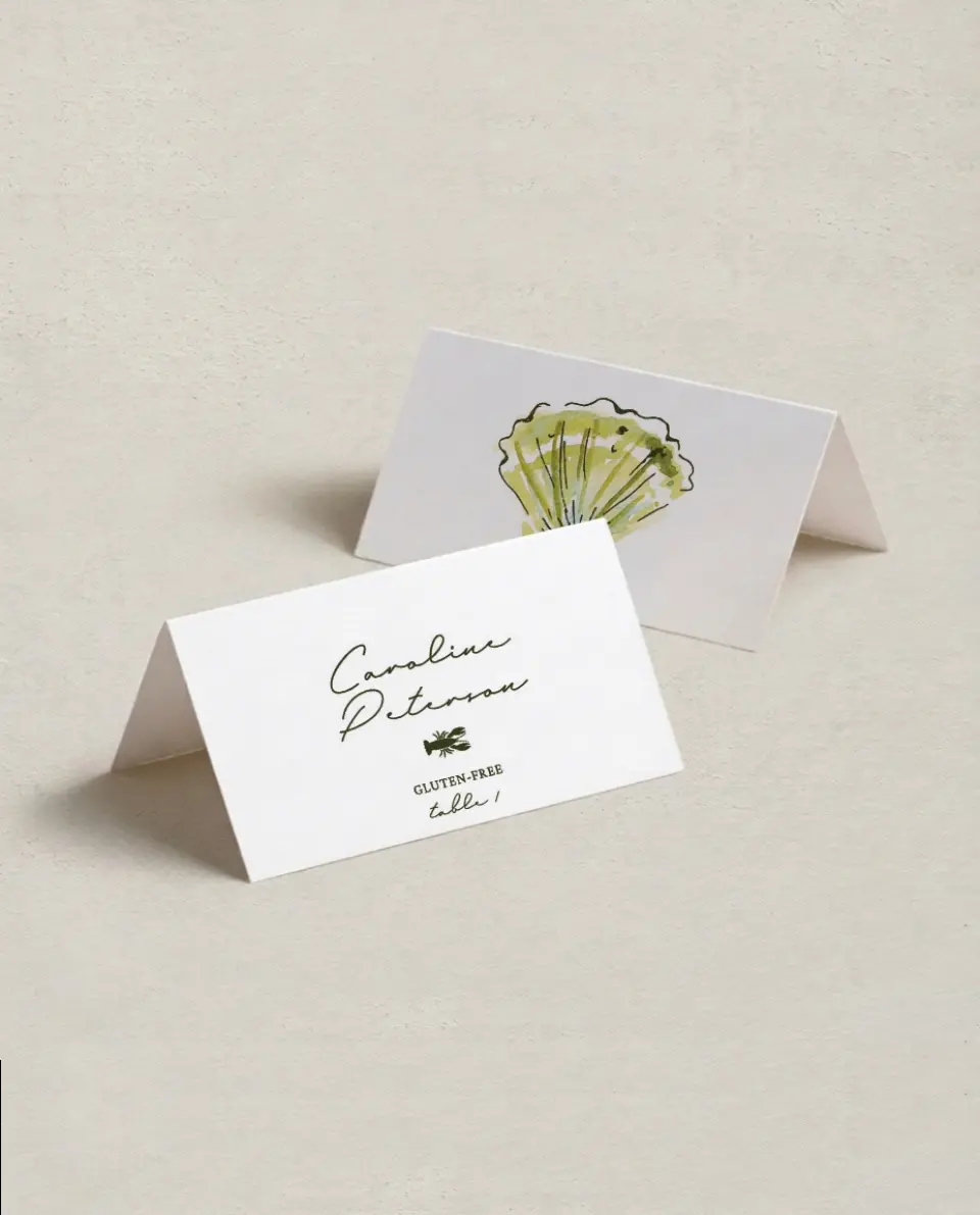 This is a 3½" x 2" Folded Wedding Place Card called Whimsical Shells printed in full color on Premium Smooth paper
