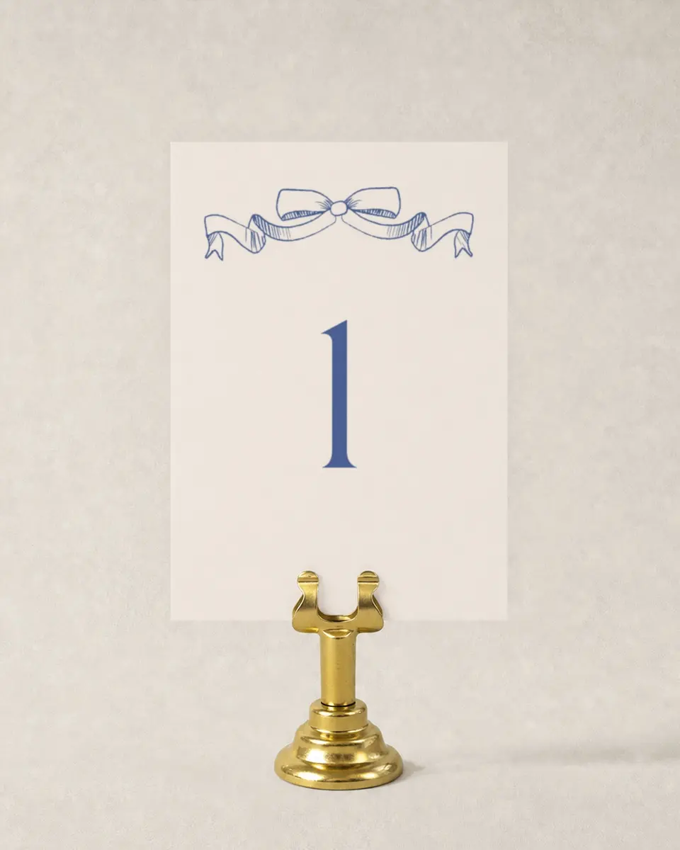 This is a 3½" x 5" Wedding Table Number called Sketched Bow printed in full color