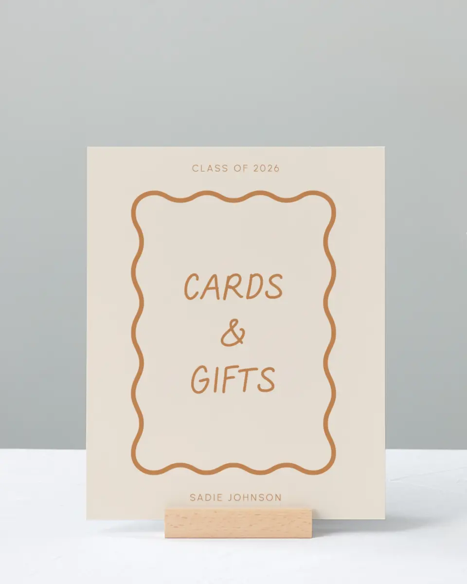 This is a 8" x 10" Cards & Gifts Grad Sign called Wavy Frame Fun printed in full color with Silver foil