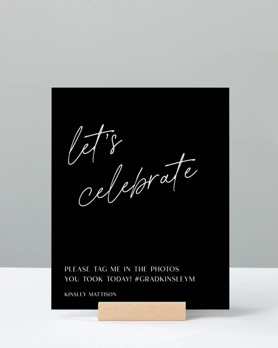 This is a 8" x 10" Let's Celebrate & Snap a Photo Grad Sign called A New Chapter printed in full color with Silver foil