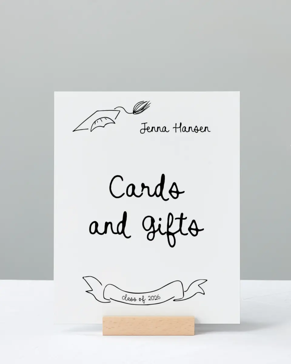 This is a 8" x 10" Cards & Gifts Grad Sign called Handwritten Grad printed in full color with Silver foil