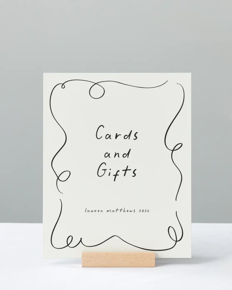 This is a 8" x 10" Cards & Gifts Grad Sign called Free to be printed in full color with Silver foil