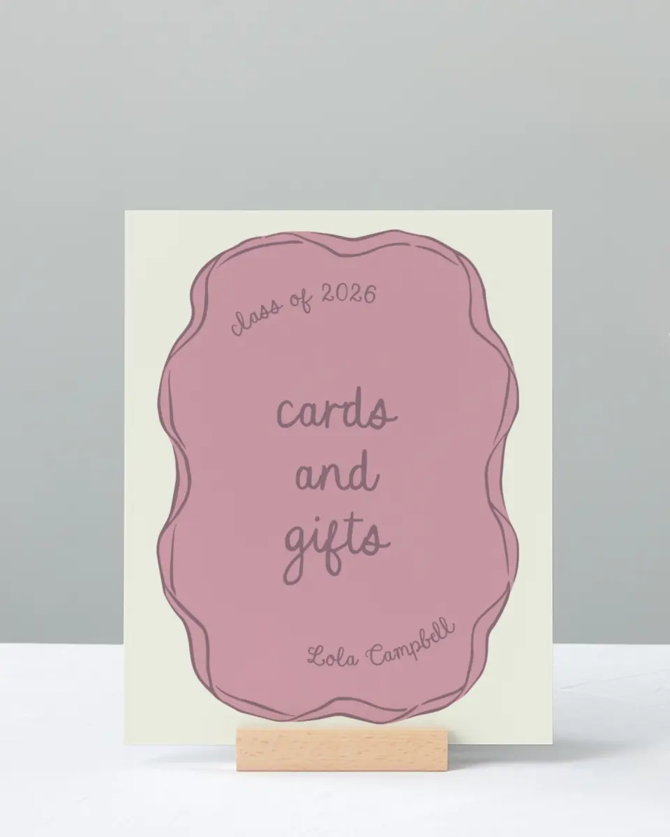 This is a 8" x 10" Cards & Gifts Grad Sign called Wrapped in Success printed in full color with Silver foil