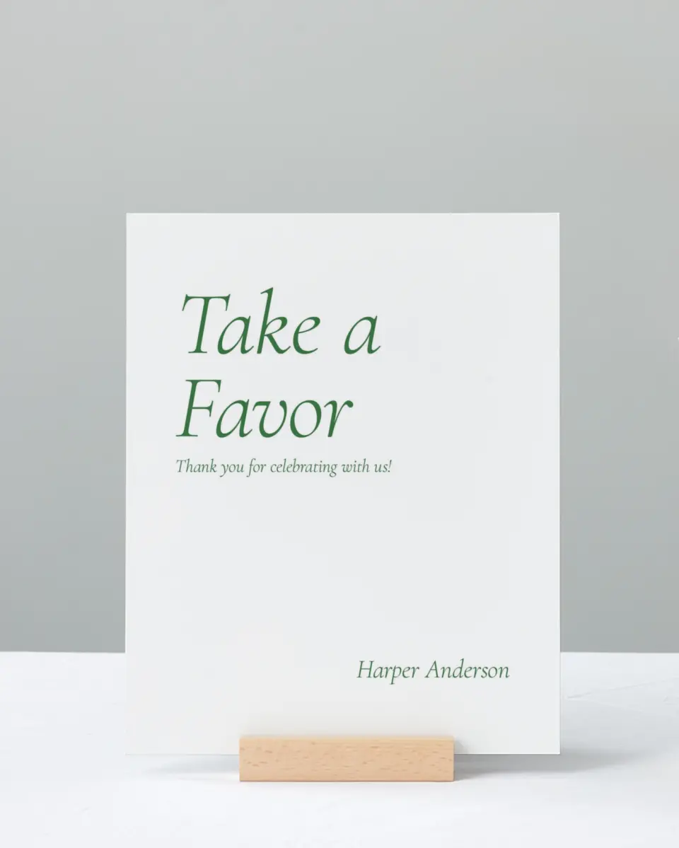 This is a 8" x 10" Take a Favor Grad Sign called Our Grad printed in full color with Silver foil