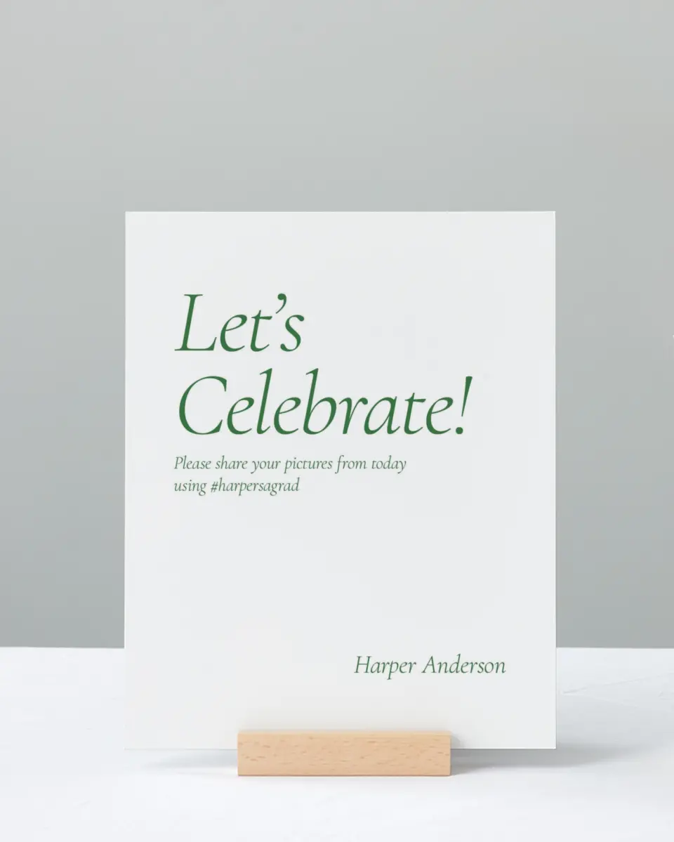 This is a 8" x 10" Let's Celebrate & Snap a Photo Grad Sign called Our Grad printed in full color with Silver foil