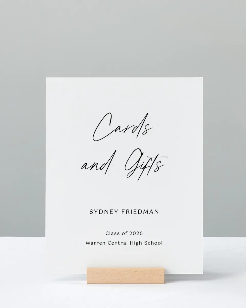 This is a 8" x 10" Cards & Gifts Grad Sign called Timeless Graduate printed in full color with Silver foil