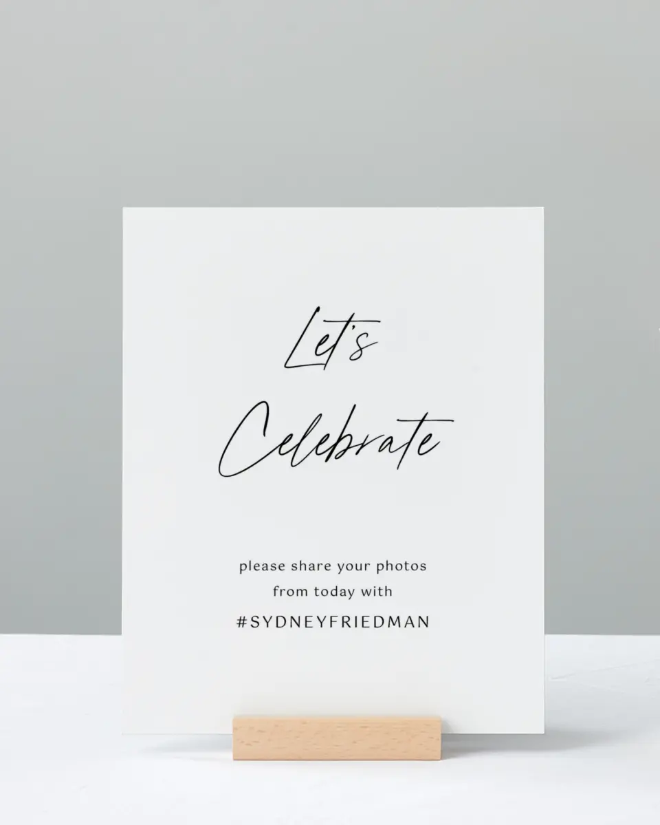 This is a 8" x 10" Let's Celebrate & Snap a Photo Grad Sign called Timeless Graduate printed in full color with Silver foil