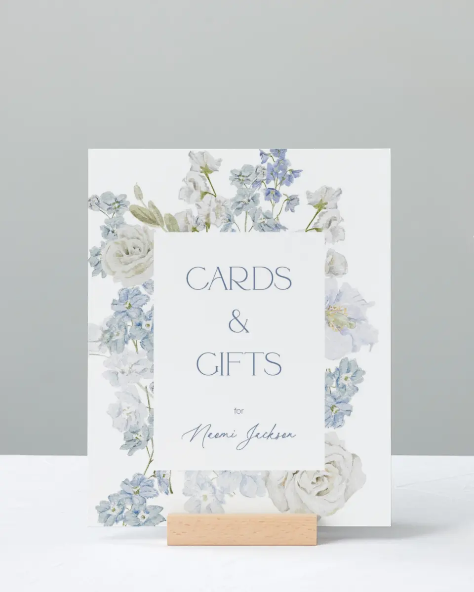 This is a 8" x 10" Cards & Gifts Baby Shower Sign called Darling Delphinium printed in full color