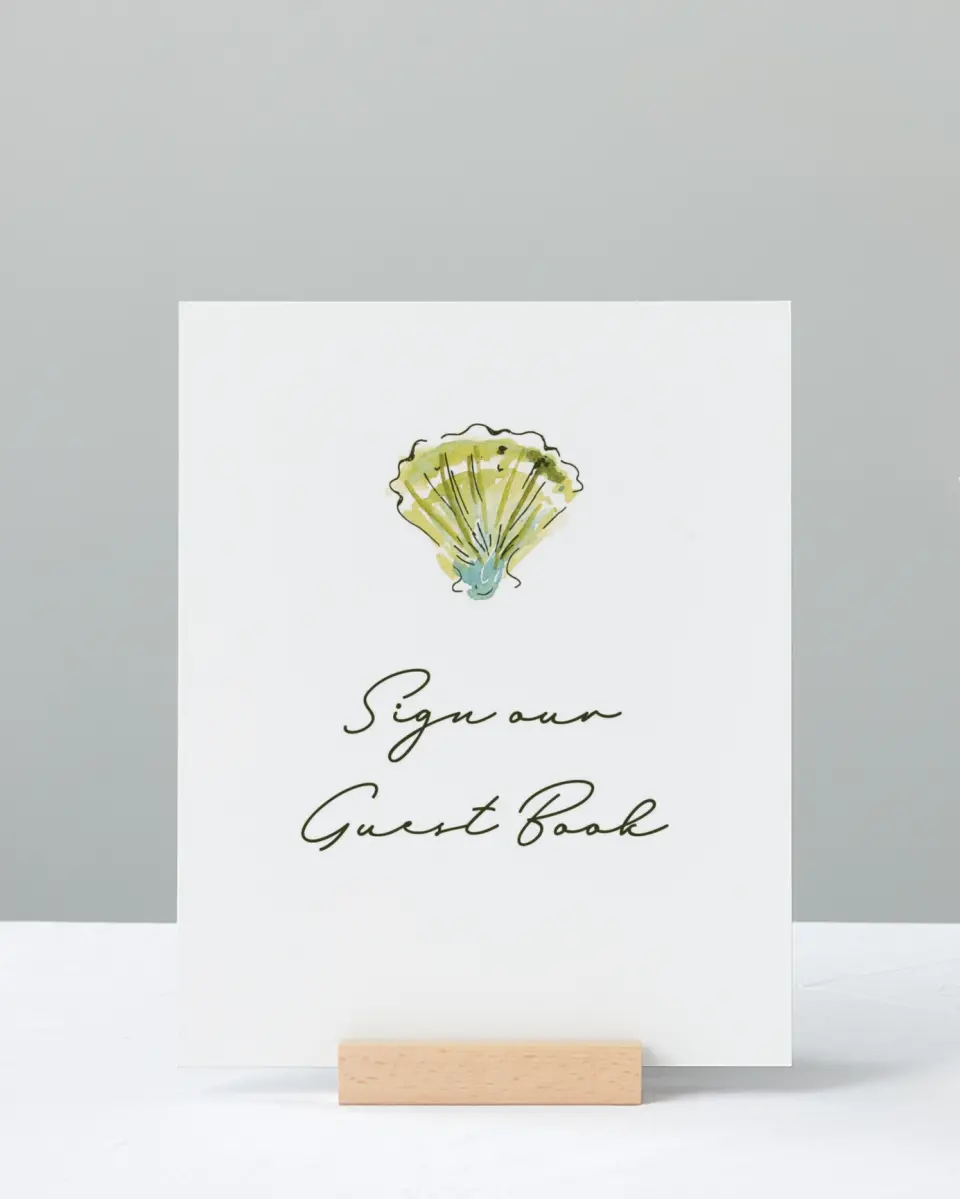 This is a 8" x 10" Guest Book Sign called Whimsical Shells printed in full color with Silver foil