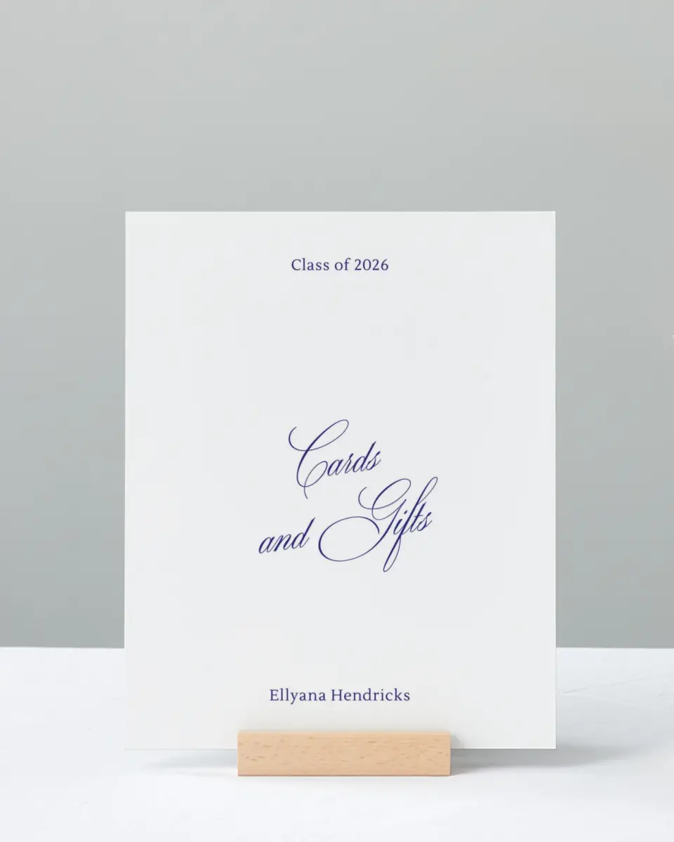 This is a 8" x 10" Cards & Gifts Grad Sign called Elegantly Graduated printed in full color with Silver foil