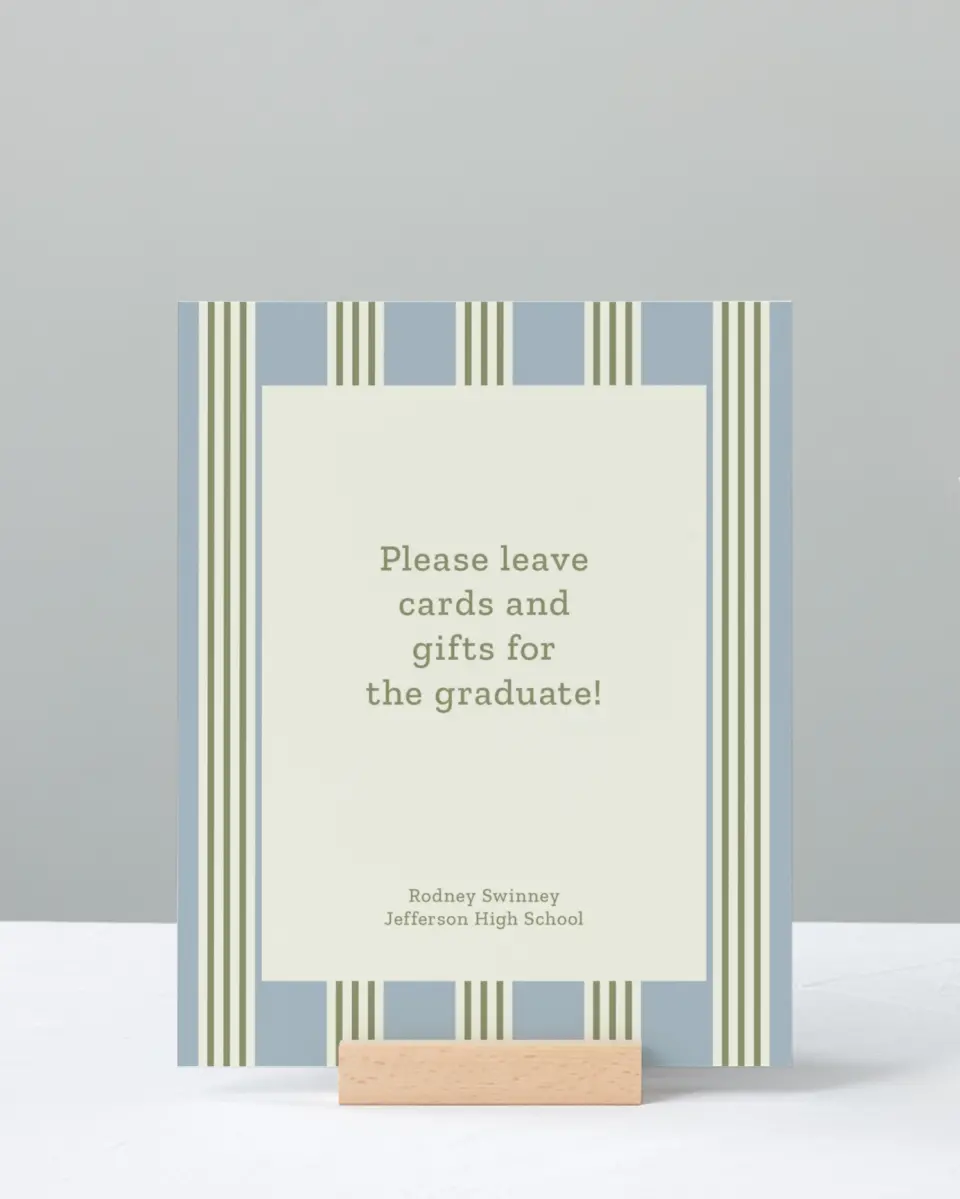 This is a 8" x 10" Cards & Gifts Grad Sign called Framed in Excellence printed in full color with Silver foil