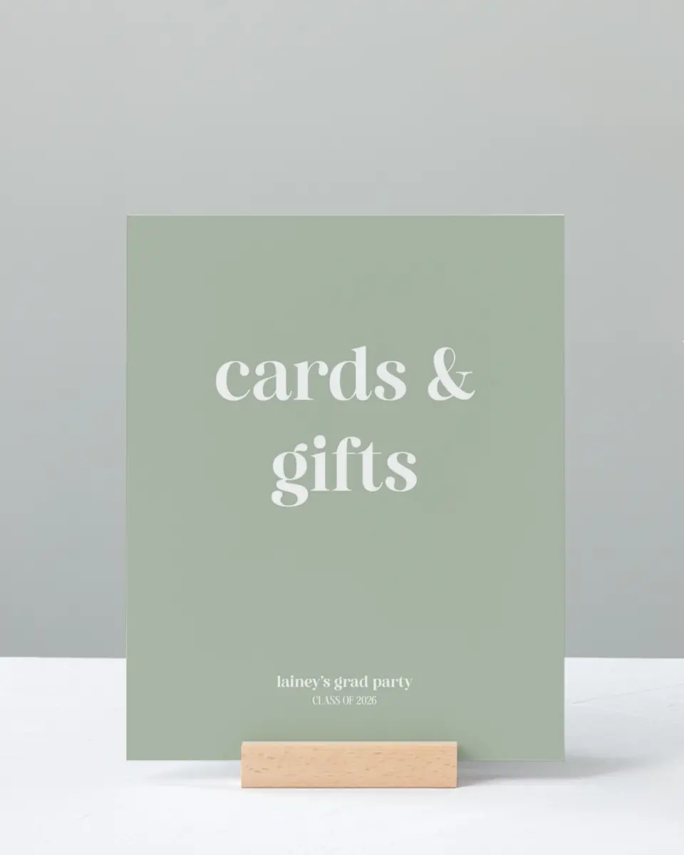 This is a 8" x 10" Cards & Gifts Grad Sign called Sweet Smiles printed in full color