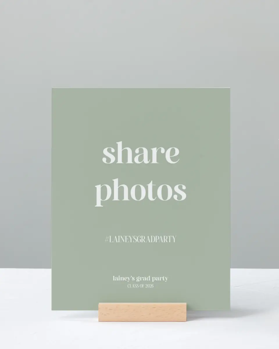 This is a 8" x 10" Let's Celebrate & Snap a Photo Grad Sign called Sweet Smiles printed in full color