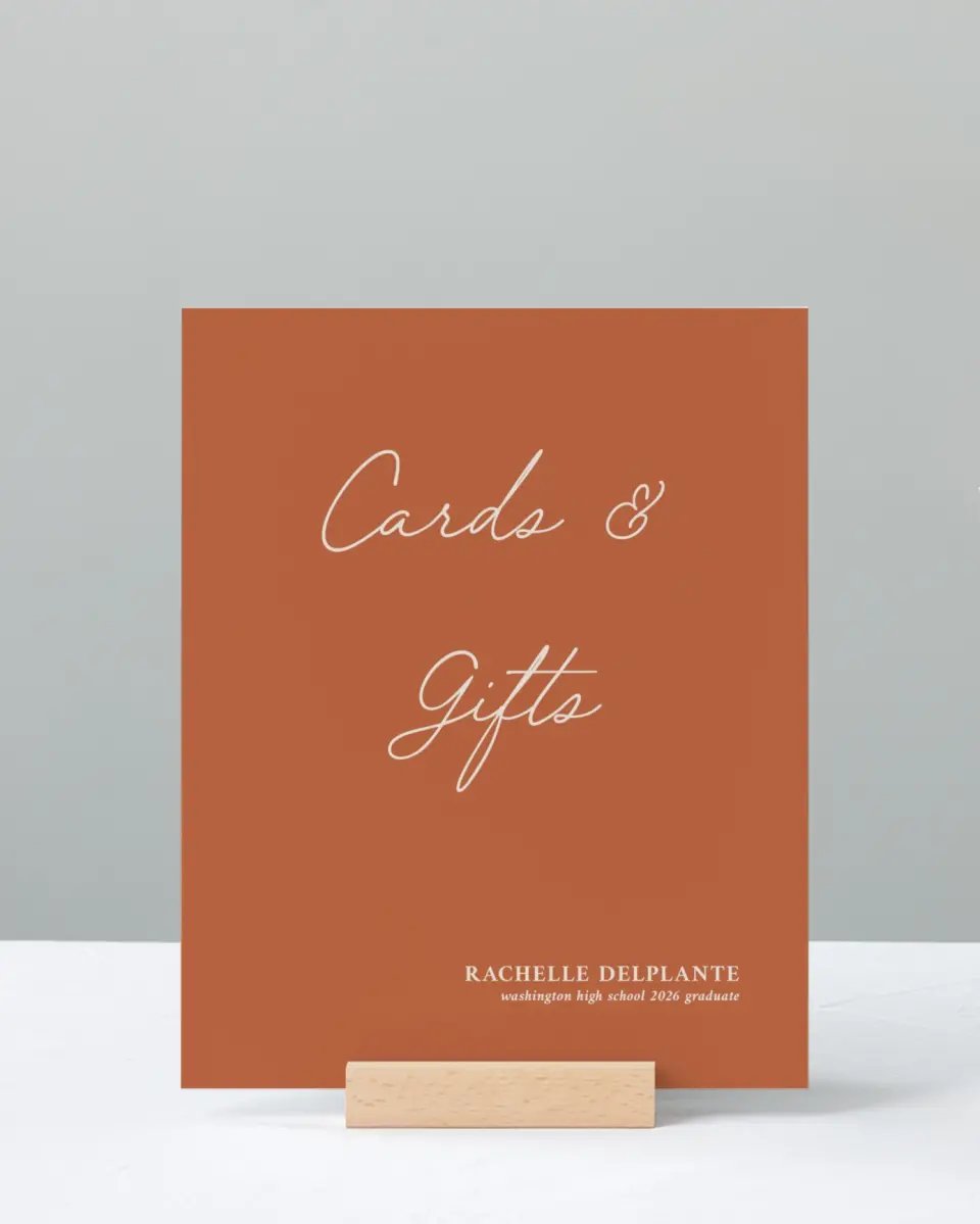 This is a 8" x 10" Cards & Gifts Grad Sign called Wholesome Grad printed in full color
