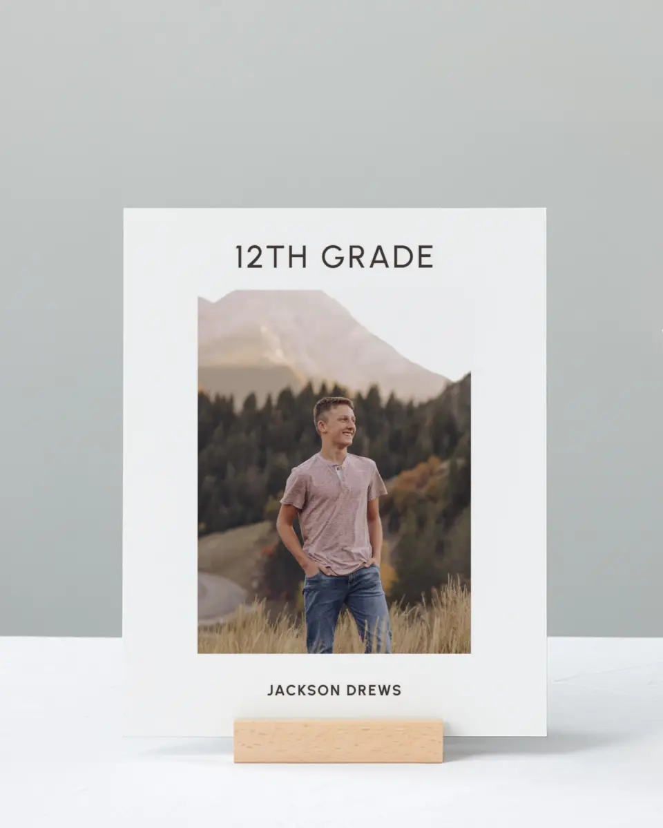 This is a 8" x 10" Photo Grad Sign called Simple Graduate printed in full color with Rose Gold foil