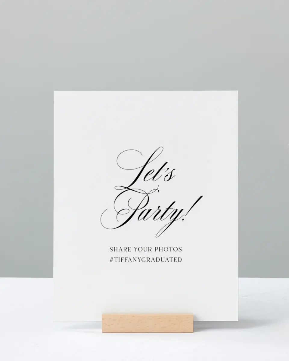 This is a 8" x 10" Let's Celebrate & Snap a Photo Grad Sign called Graduate Script printed in full color with Silver foil