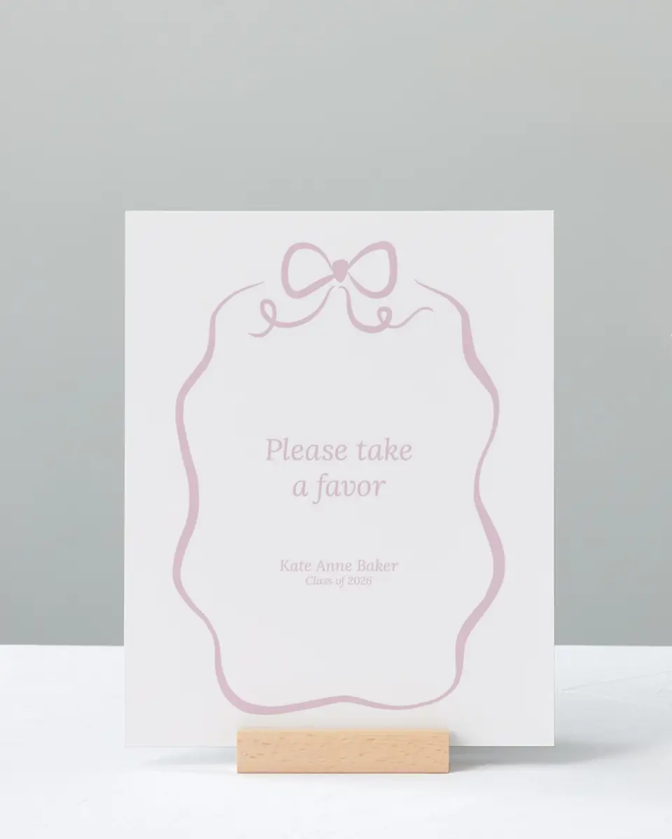This is a 8" x 10" Take a Favor Grad Sign called Bow Grad printed in full color with Gold foil