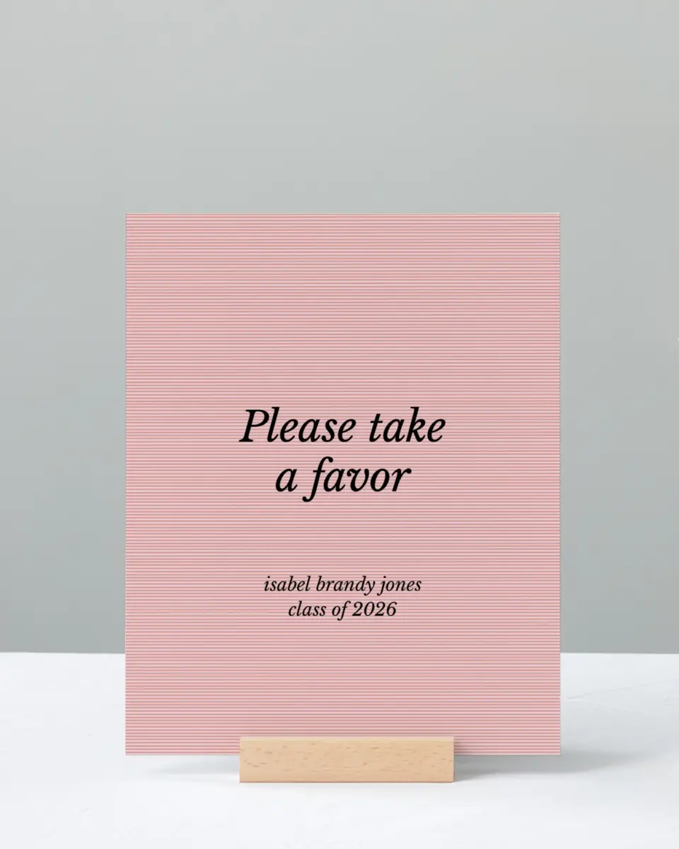 This is a 8" x 10" Take a Favor Grad Sign called Snapshot Graduate printed in full color with Rose Gold foil
