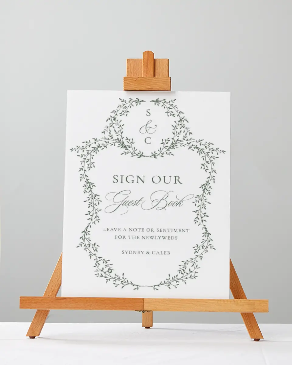 This is a 5" x 7" Guest Book Sign called Elegant Frame printed in full color with Silver foil
