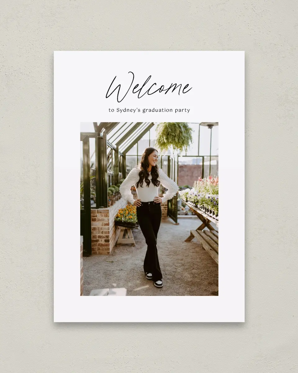 This is a 20" x 28" Welcome Grad Sign called Timeless Graduate printed in full color