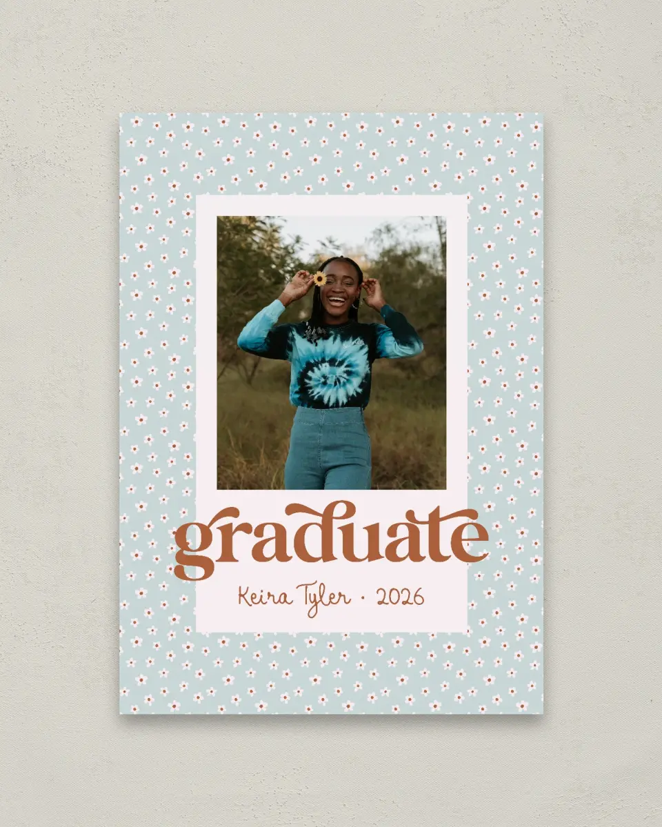 This is a 20" x 28" Welcome Grad Sign called Demure Daisies printed in full color