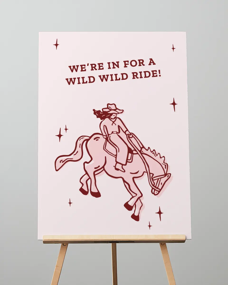 This is a 20" x 28" Welcome Sign called Wild Wild Wife printed in full color with Rose Gold foil
