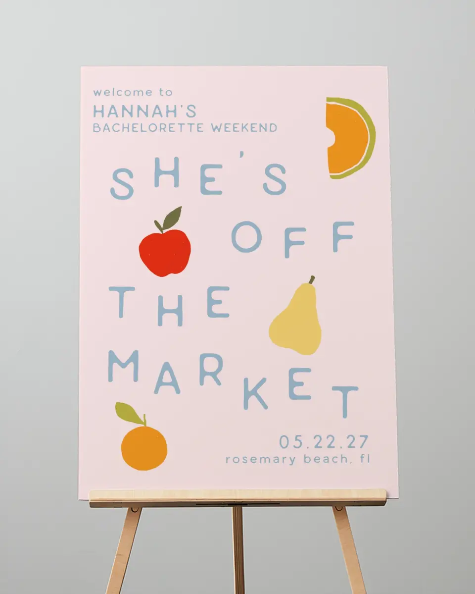 This is a 20" x 28" Welcome Sign called She's Off the Market printed in full color with Rose Gold foil