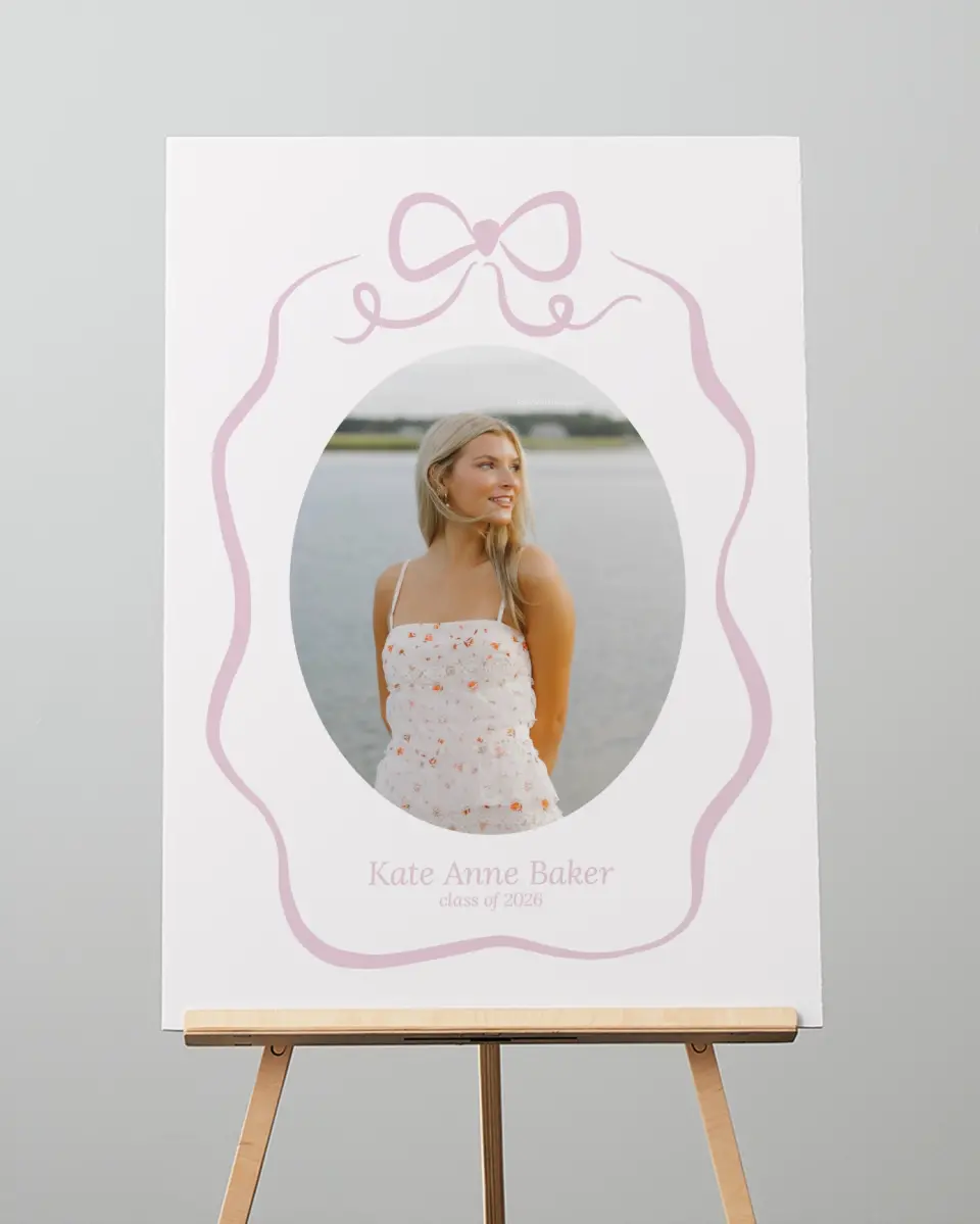This is a 20" x 28" Welcome Grad Sign called Bow Grad printed in full color with Gold foil