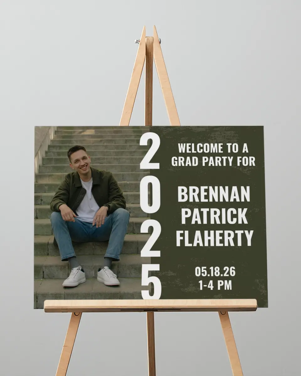 This is a 16" x 20" Welcome Grad Sign called Genuine Graduate printed in full color with Silver foil