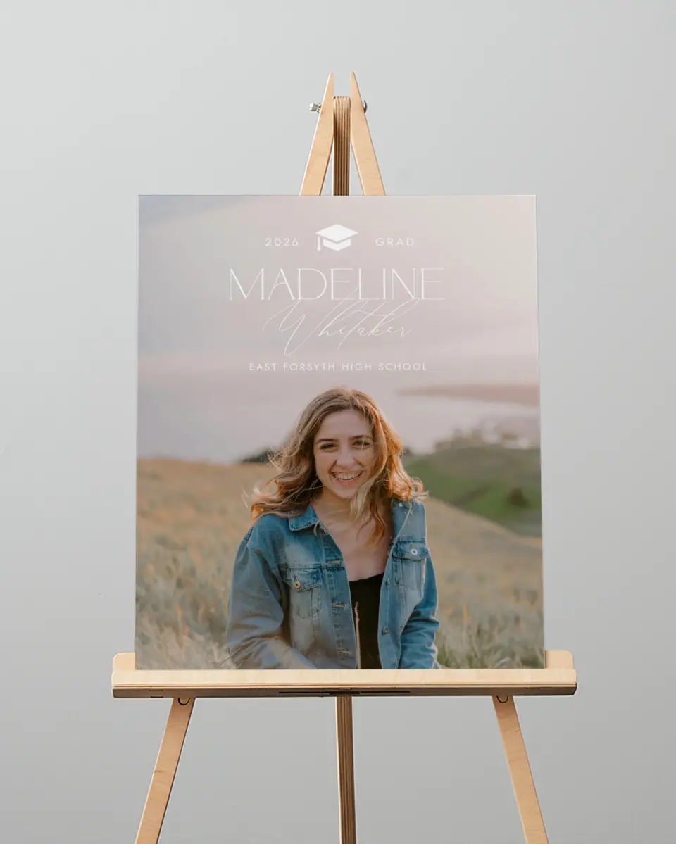 This is a 16" x 20" Welcome Grad Sign called Crowning Moment printed in full color with Silver foil