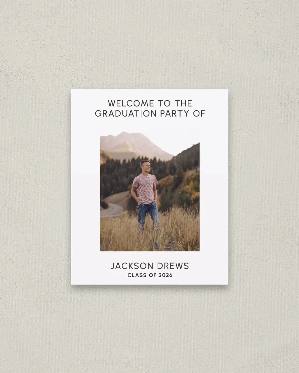 This is a 16" x 20" Welcome Grad Sign called Simple Graduate printed in full color with Gold foil