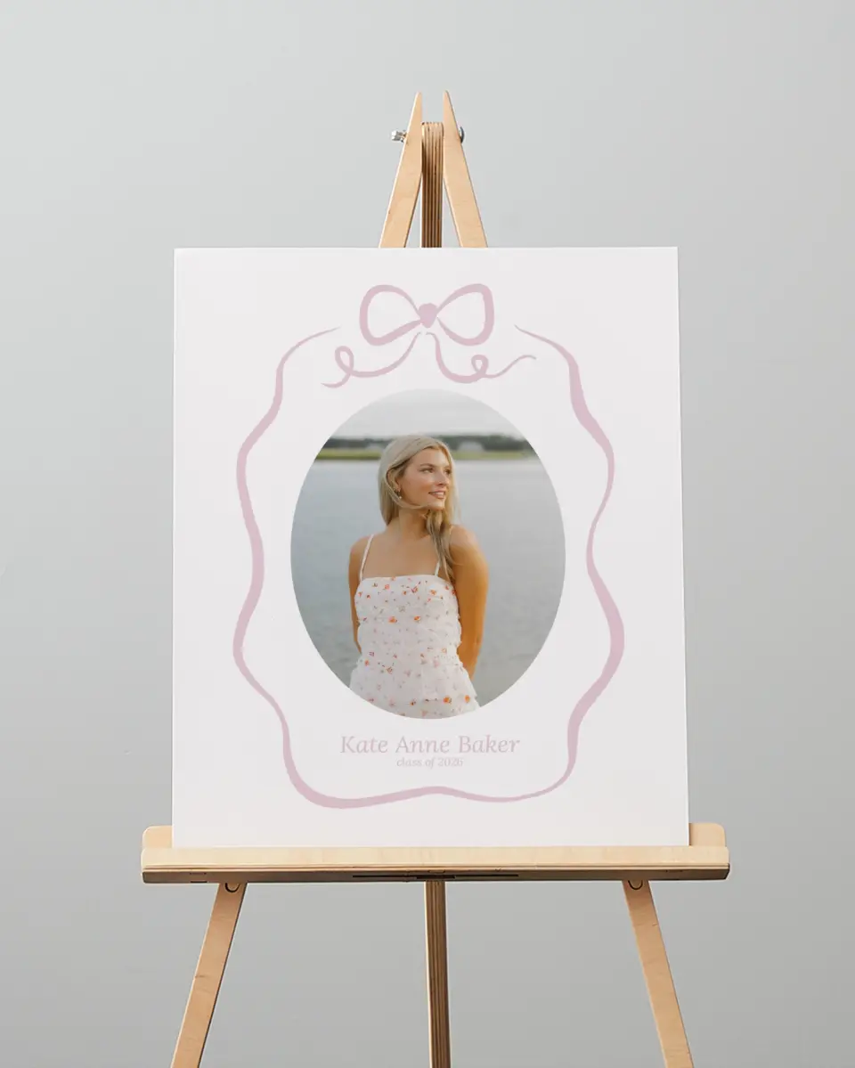 This is a 16" x 20" Welcome Grad Sign called Bow Grad printed in full color with Gold foil
